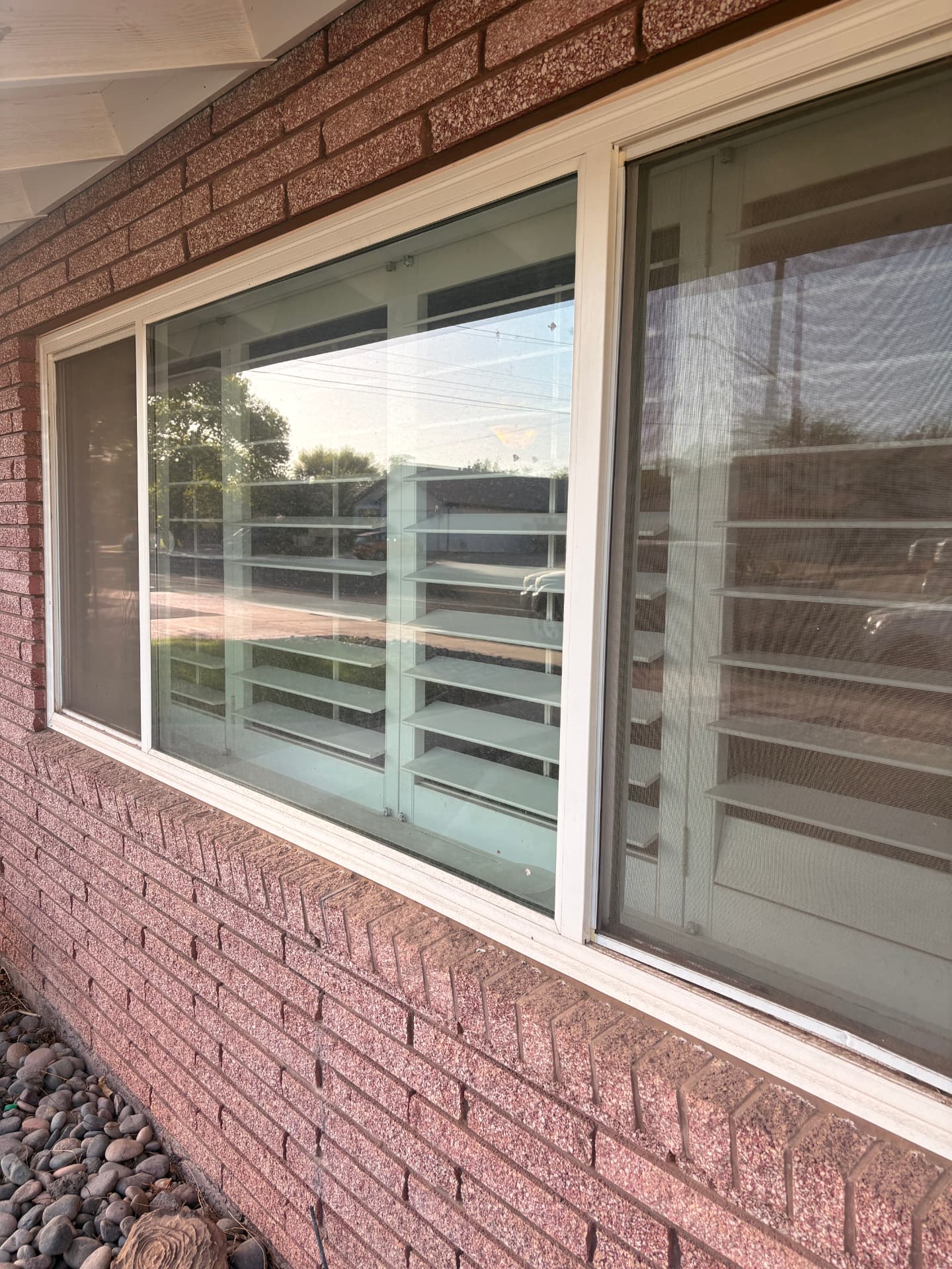 Residential picture window — before cleaning